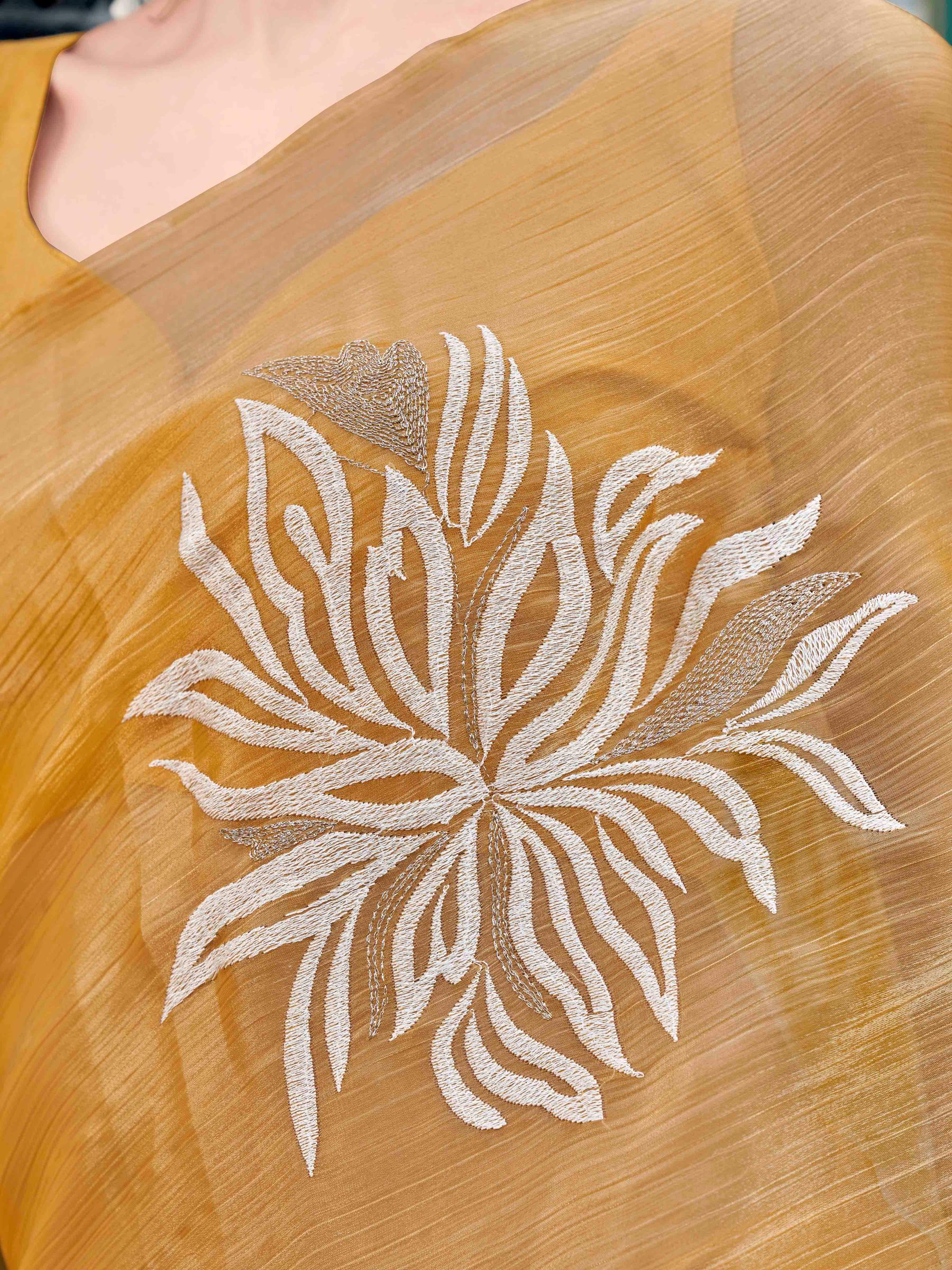 Yellow colored embroidred designer saree